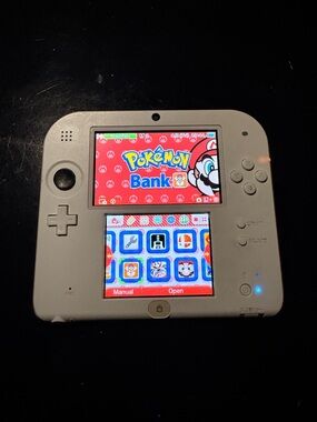 Nintendo 2DS Console White/Red with Pokémon bank, Poké transporter, & Games